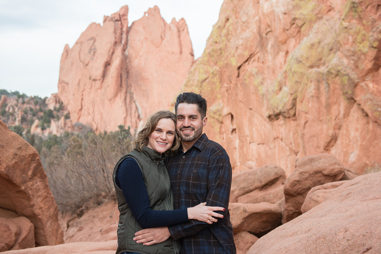 couple in front of red rocks at Garden of the Gods